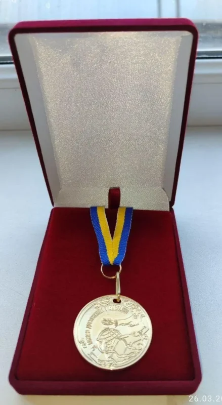 Золота медаль у футляоі
